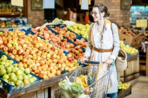 Woman buying food in the supermarket